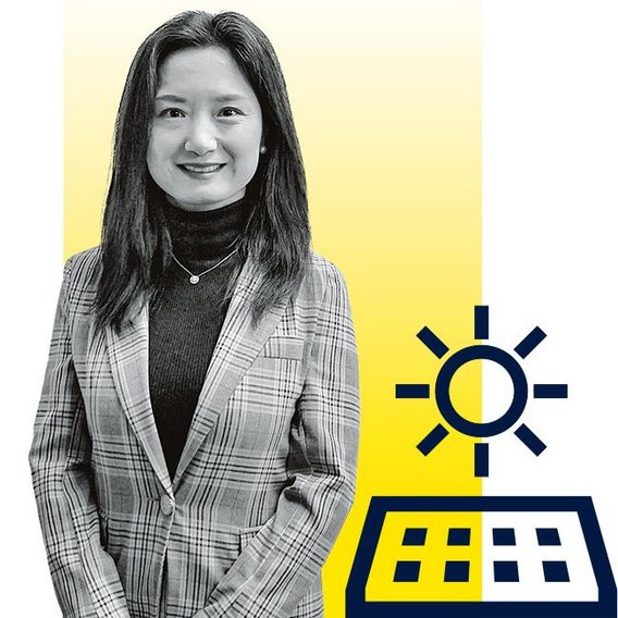 Portrait of Angella Xu with Solar panel and sun icon in the background
